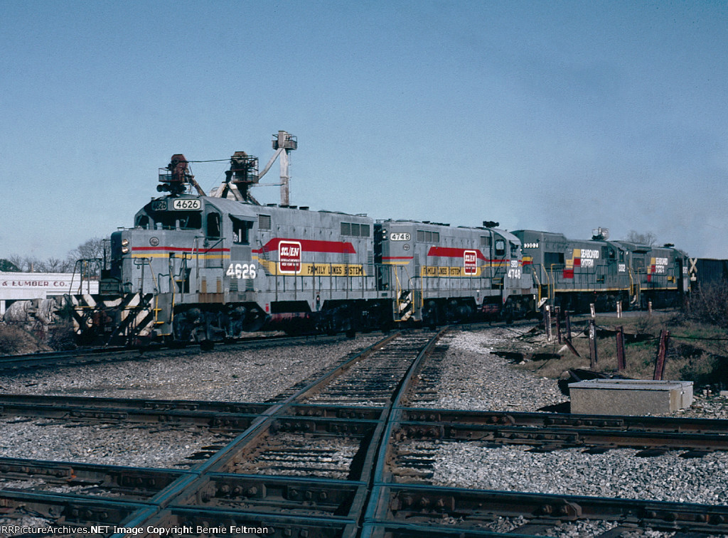 Seaboard System GP16's #4626 & 4748, U23B #3302 & U36B #5757 lead a northbound over the former Seaboard Air Line and Southern Railway diamonds 